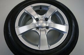 Ford Fusion - 15" alu kola - Letní pneu - 8