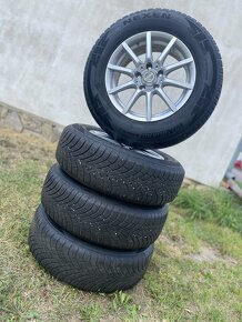 ALU kola 5x114,3 R16 + 7mm zimní 215/70 r16 - 9