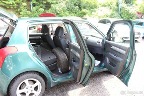 Suzuki Swift 1.3i - 9